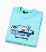 Cyan beach graphic T-shirt for boys folded